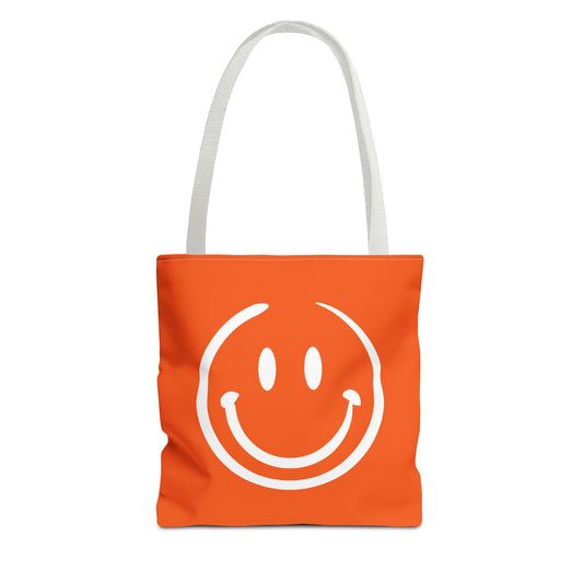 orange with white smiley face Tote Bag