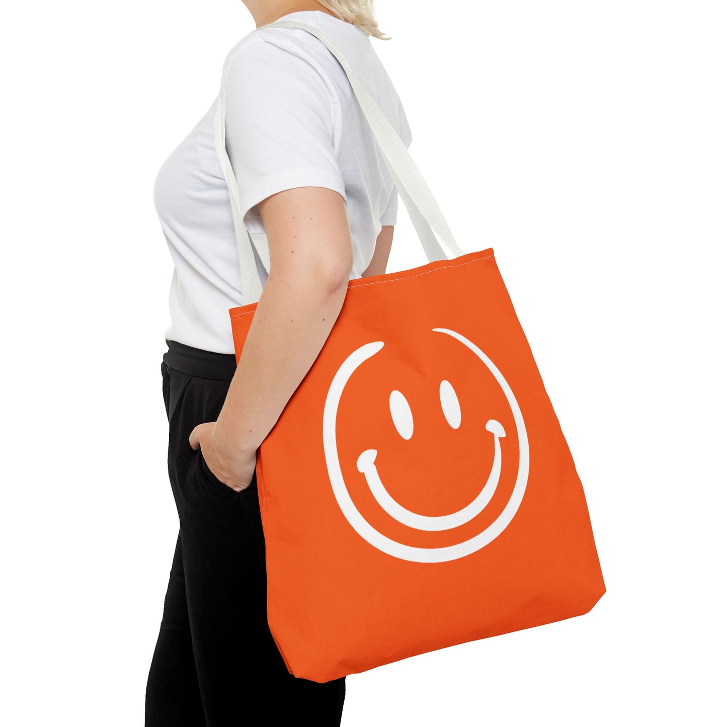 orange with white smiley face Tote Bag